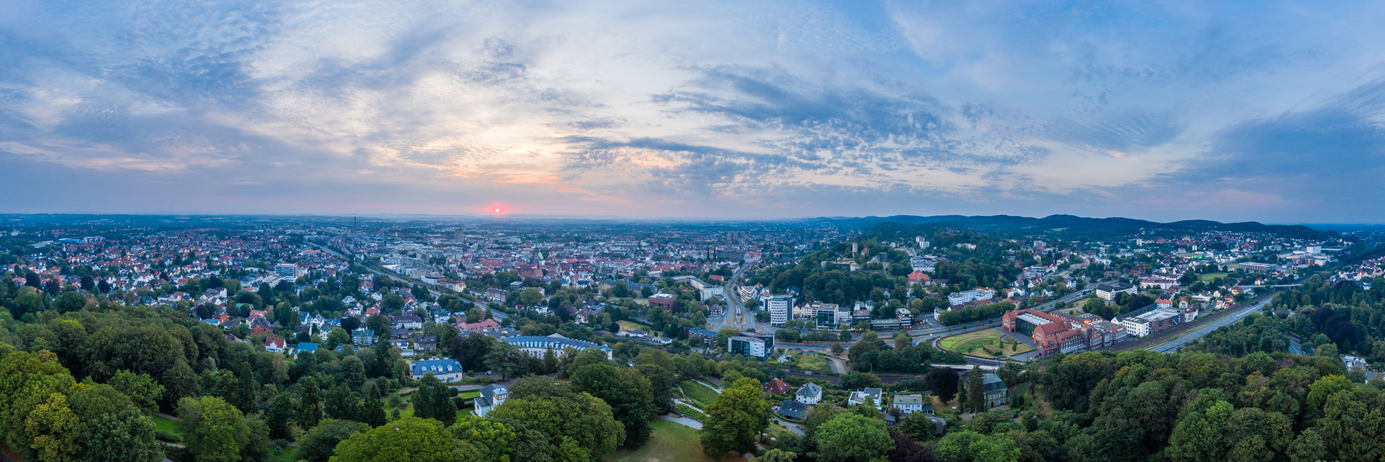 Sunrise over the city centre in August 2020 (Bielefeld, Germany).