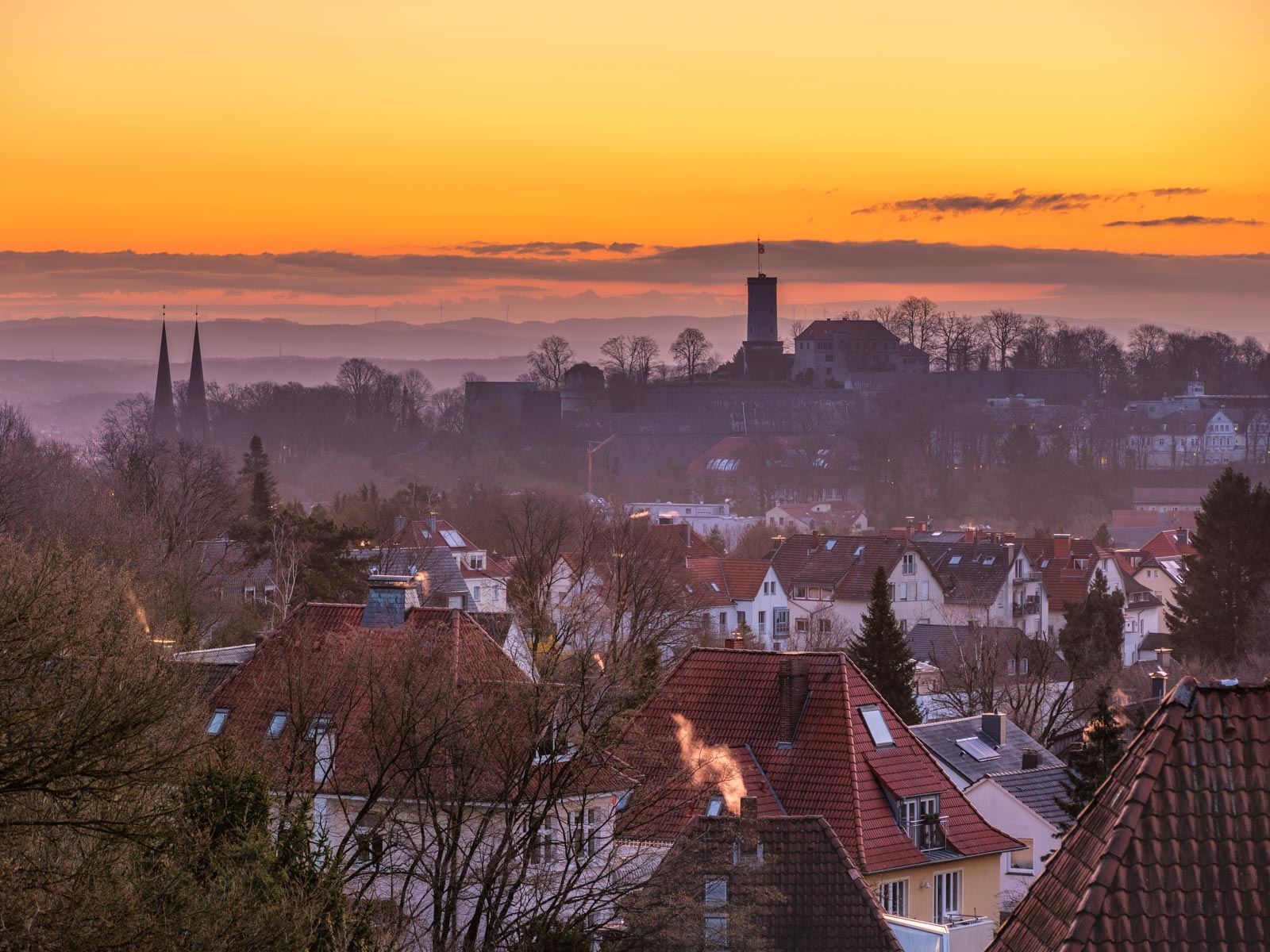 Spring sunrise over Bielefeld with Sparrenburg Castle.