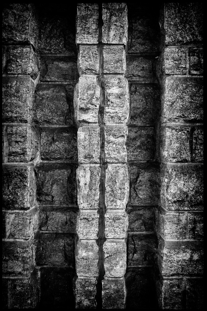 wall under a railway bridge