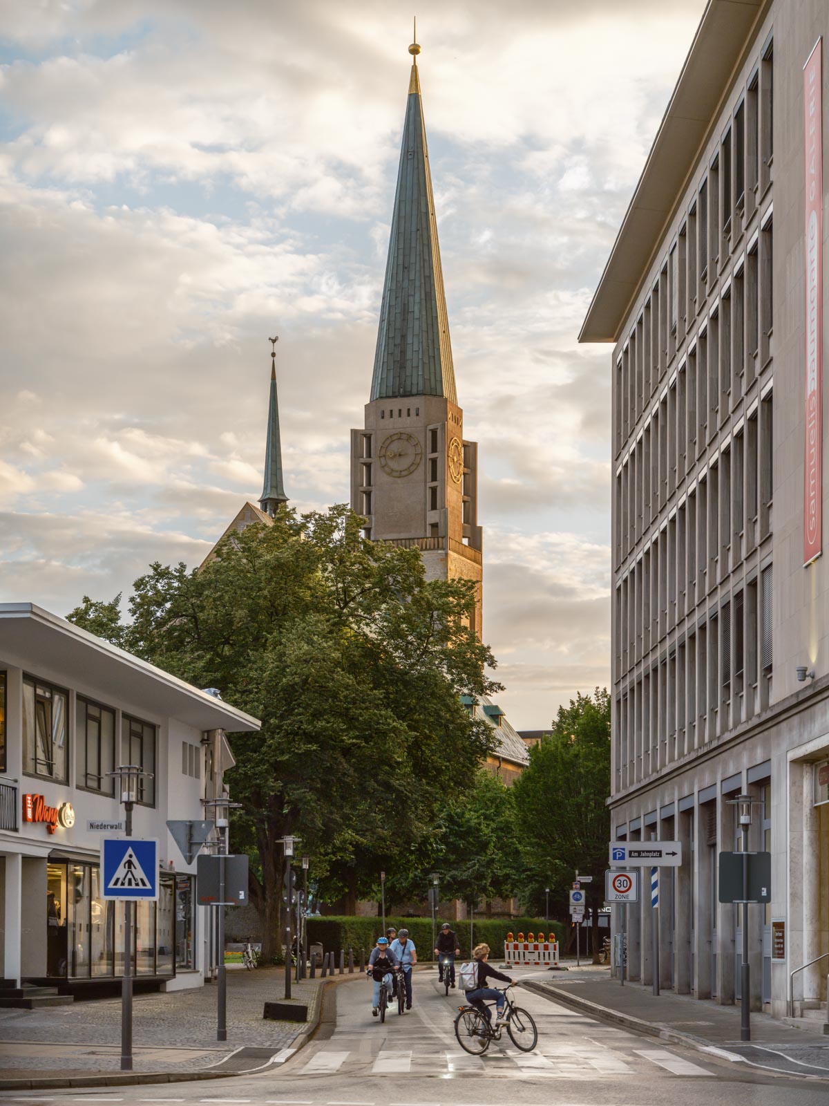 Cyclists in the city center in July 2021 (Bielefeld, Germany).