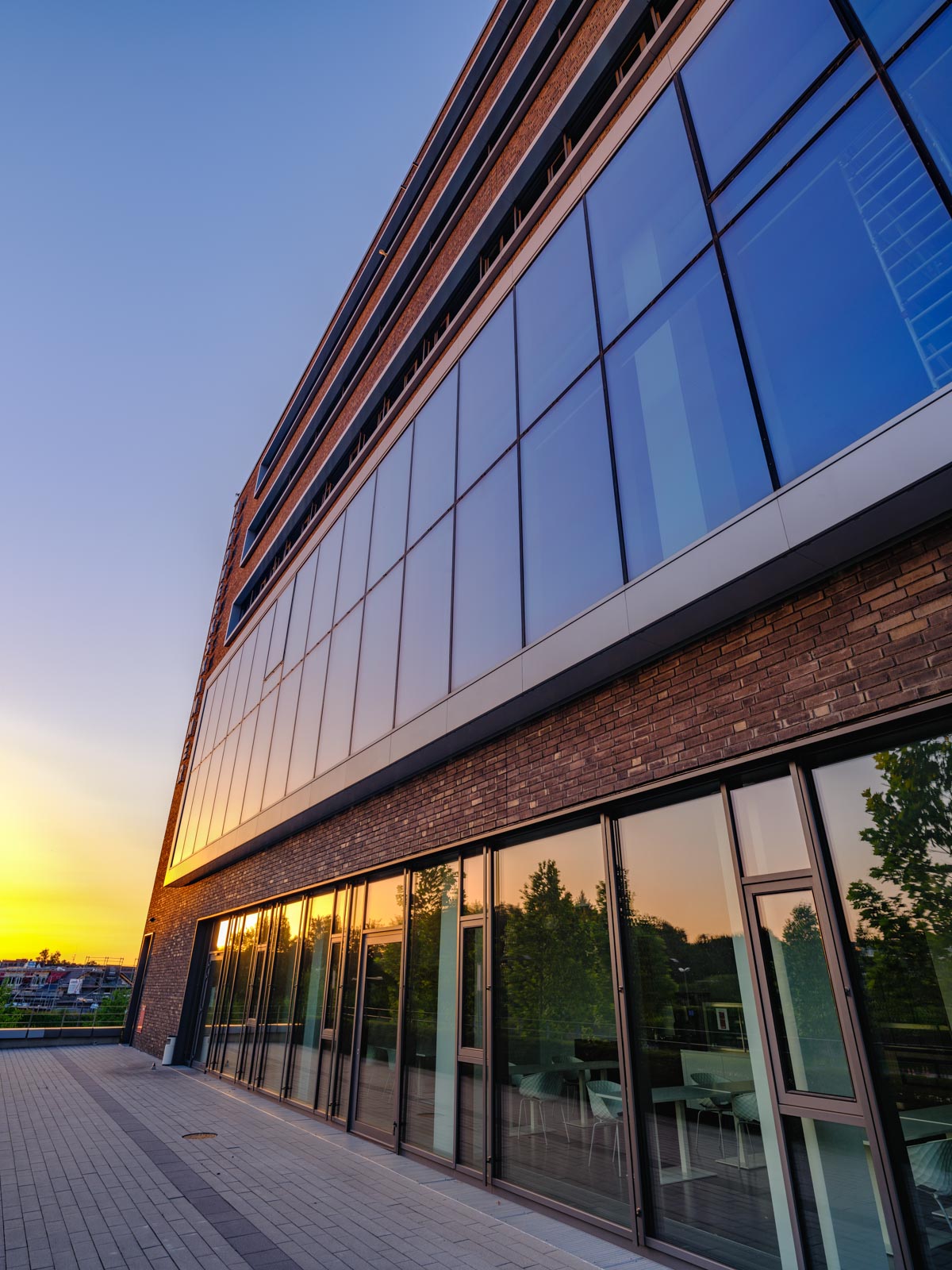 Building of the 'Campus Handwerk' at dusk in July 2021 (Bielefeld, Germany).