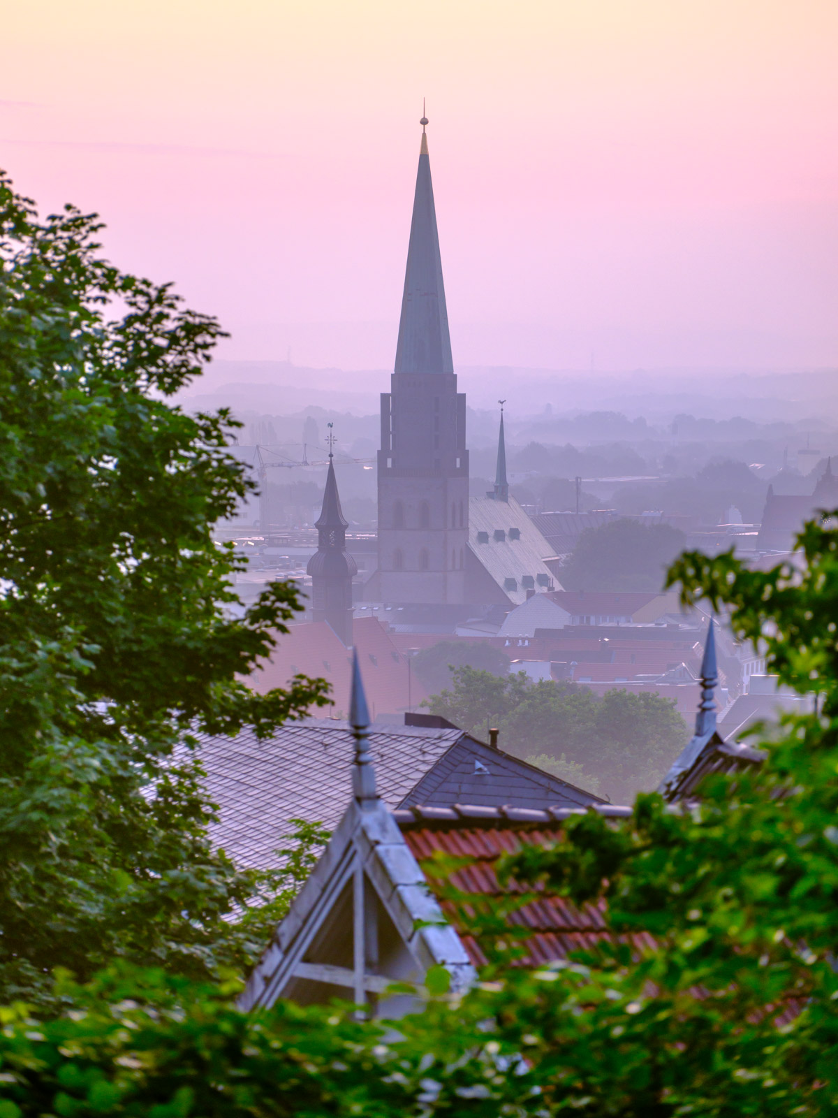 Tower of Nikolai Church at dawn in July 2021 (Bielefeld, Germany).