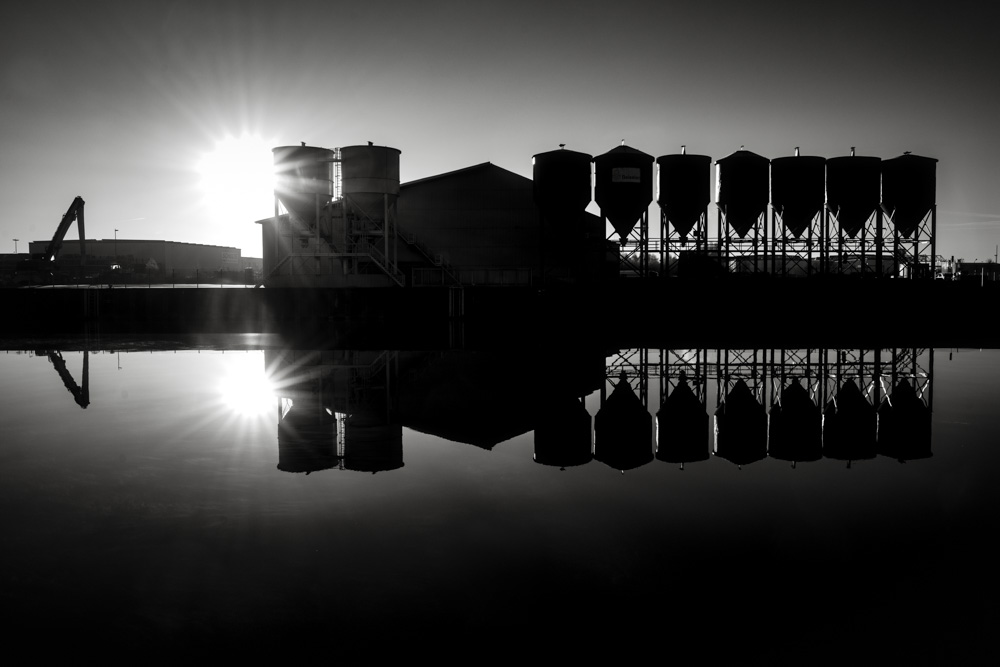 Silhouette of an warehouse an silo complex at the 'Datteln-Hamm-Kanal' in Hamm, Germany.
