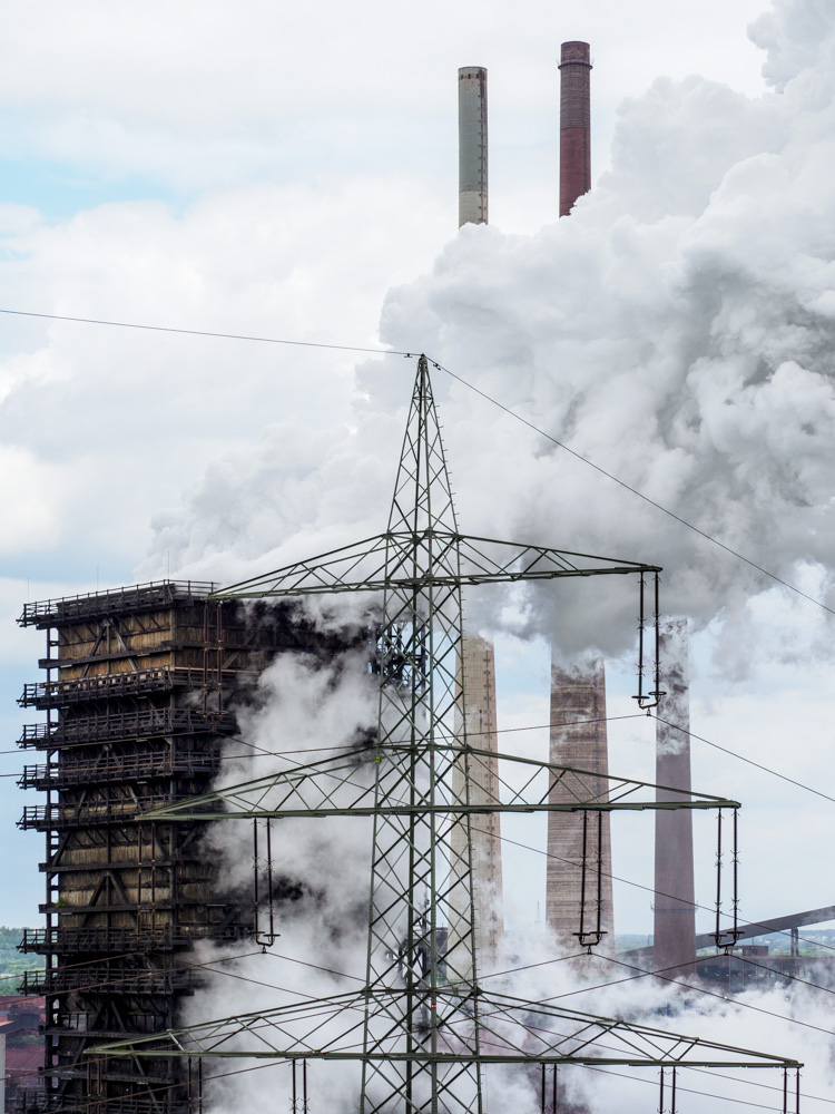 Steam from the coking of the ThyssenKrupp steelworks in Duisburg-Schwelgern.